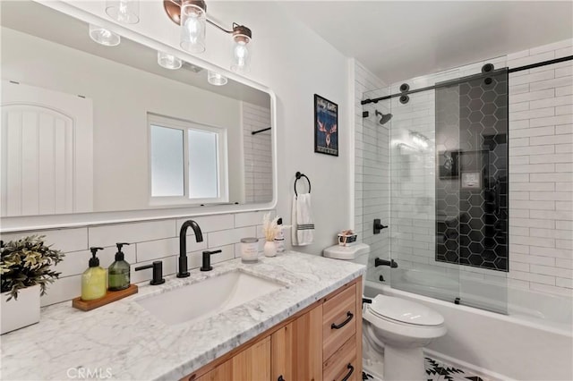 698 W Victoria Ct, Lake Arrowhead, CA 92352 - full bathroom featuring vanity, bath / shower combo with glass door, toilet, and backsplash