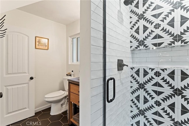 698 W Victoria Ct, Lake Arrowhead, CA 92352 - bathroom with a shower stall, toilet, vanity, and tile patterned floors