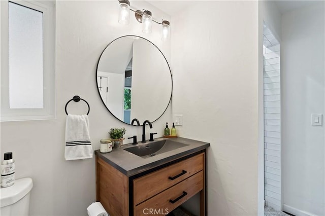 698 W Victoria Ct, Lake Arrowhead, CA 92352 - bathroom with toilet, vanity, and a shower
