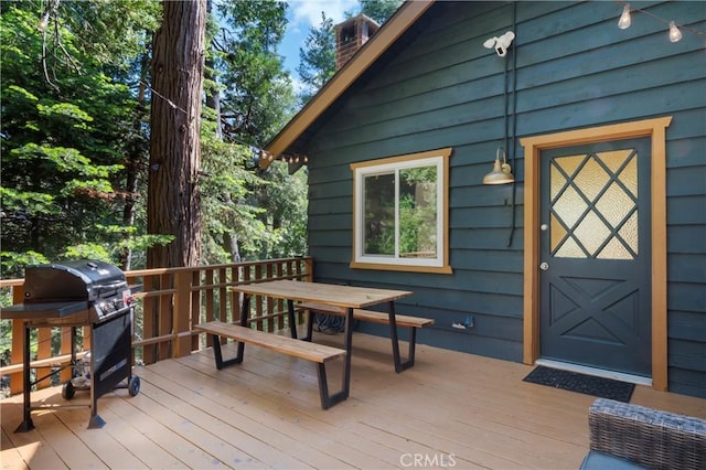 698 W Victoria Ct, Lake Arrowhead, CA 92352 - wooden terrace featuring grilling area and outdoor dining space