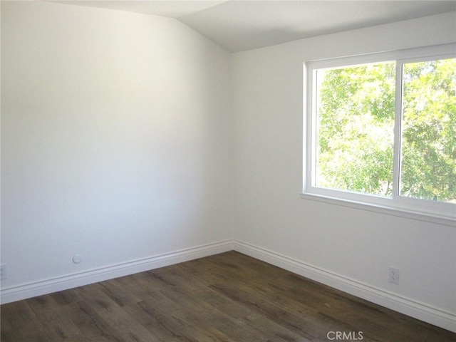 26925 Via Grande, Mission Viejo, CA 92691 - unfurnished room with plenty of natural light, dark wood-type flooring, lofted ceiling, and baseboards