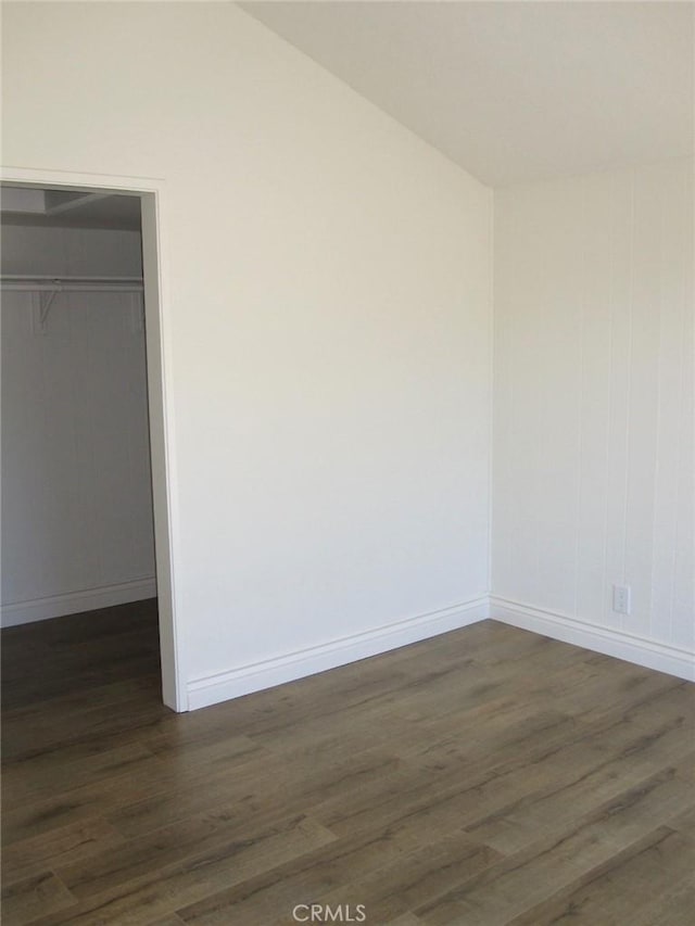 26925 Via Grande, Mission Viejo, CA 92691 - spare room with dark wood finished floors, baseboards, and vaulted ceiling