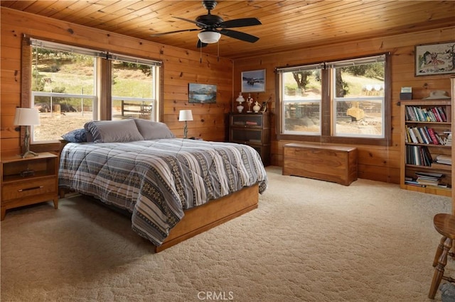 9000 Figueroa Mountain Rd, Los Olivos, CA 93441 - bedroom featuring wooden ceiling, wooden walls, carpet flooring, and a ceiling fan