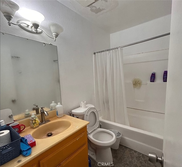 full bath with tile patterned flooring, shower / tub combo, vanity, and toilet