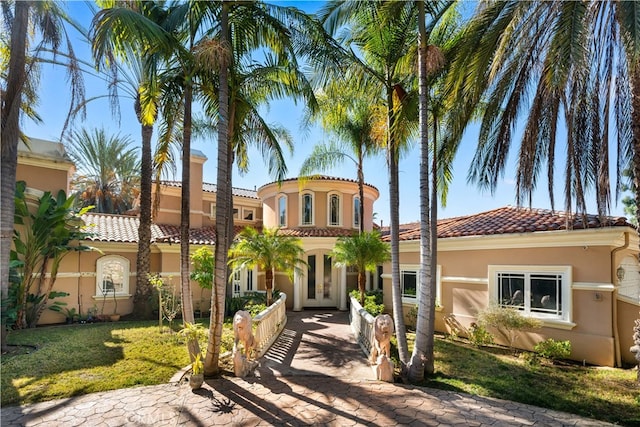 1782 Chota Rd, La Habra Heights, CA 90631 - mediterranean / spanish home with french doors, stucco siding, a tiled roof, and a front yard