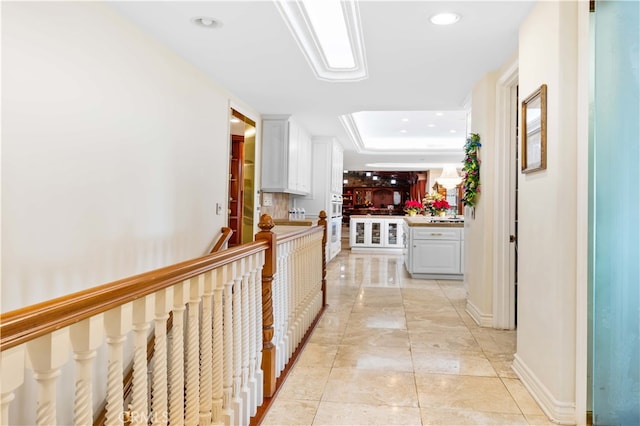 1782 Chota Rd, La Habra Heights, CA 90631 - hallway featuring a raised ceiling, recessed lighting, and baseboards