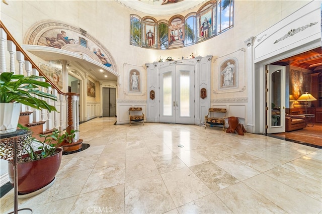 1782 Chota Rd, La Habra Heights, CA 90631 - community lobby with a decorative wall, a towering ceiling, and crown molding