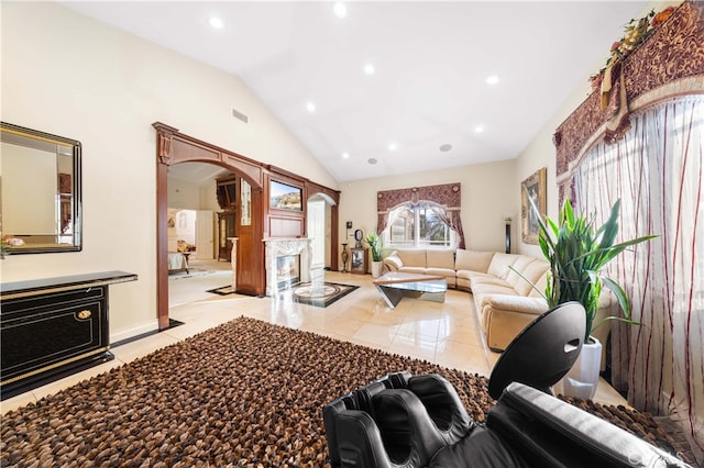 1782 Chota Rd, La Habra Heights, CA 90631 - living room featuring arched walkways, recessed lighting, and high vaulted ceiling