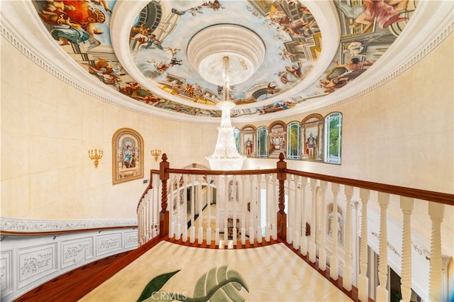 1782 Chota Rd, La Habra Heights, CA 90631 - hallway featuring crown molding, a chandelier, and tile walls