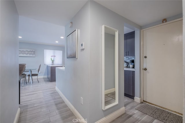 1517 E Garfield Ave Unit 94, Glendale, CA 91205 - hallway with light wood-style floors, baseboards, and recessed lighting