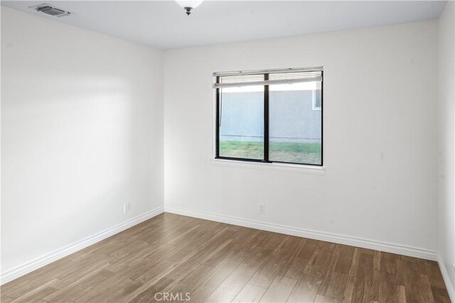 27535 Lakeview Dr Unit 37, Helendale, CA 92342 - unfurnished room with wood finished floors and baseboards