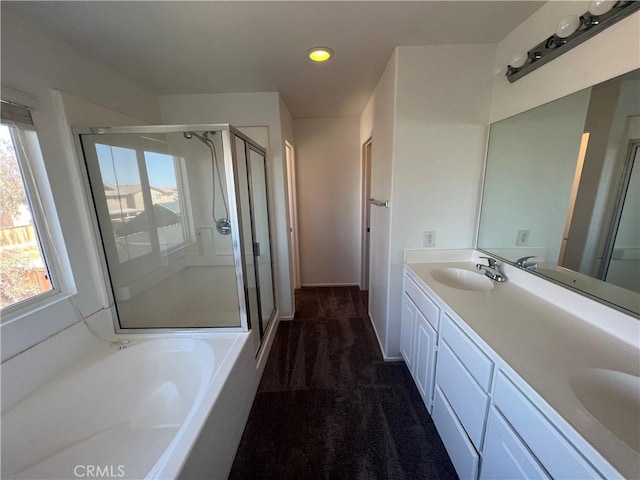12418 Firefly Way, Victorville, CA 92392 - bathroom featuring a stall shower, a garden tub, double vanity, and recessed lighting