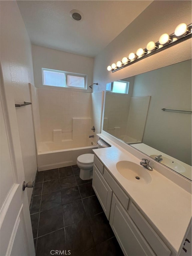 12418 Firefly Way, Victorville, CA 92392 - full bathroom featuring tub / shower combination, toilet, vanity, and tile patterned floors