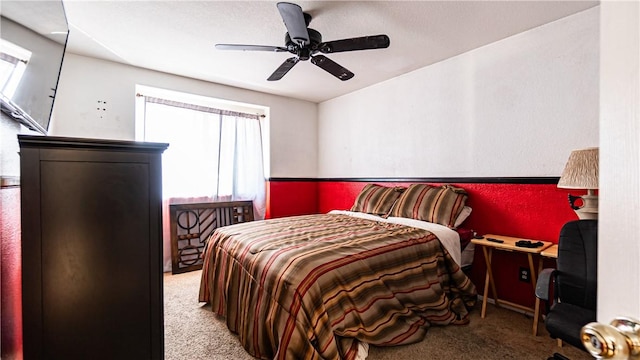 bedroom featuring carpet floors, multiple windows, and ceiling fan