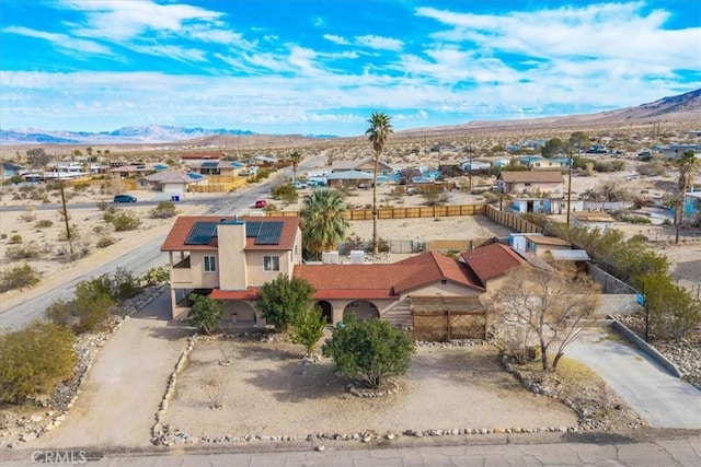 7565 Sherman Hoyt Ave Unit 29, Palms, CA 92277 - aerial perspective of suburban area featuring a mountainous background