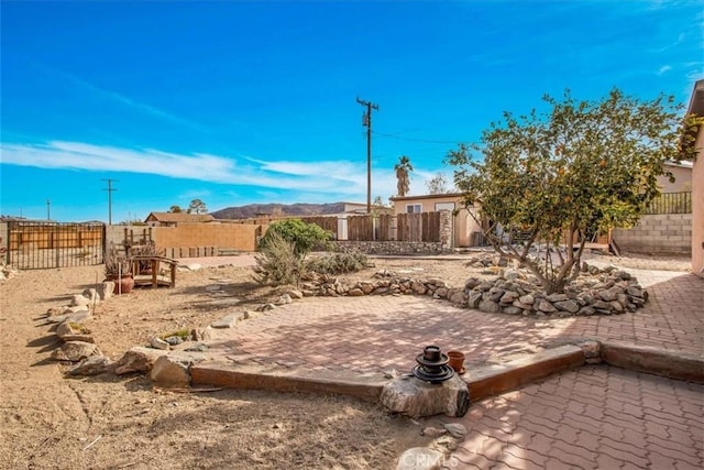 7565 Sherman Hoyt Ave Unit 29, Palms, CA 92277 - fenced backyard featuring a patio area