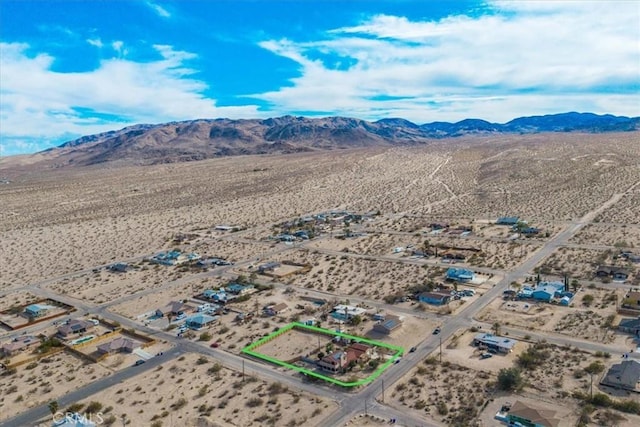 7565 Sherman Hoyt Ave Unit 29, Palms, CA 92277 - view of rural area with a desert landscape, a mountain backdrop, and property parcel outlined