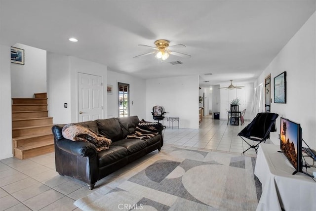 7565 Sherman Hoyt Ave Unit 29, Palms, CA 92277 - living room featuring ceiling fan, light tile patterned flooring, stairway, and recessed lighting