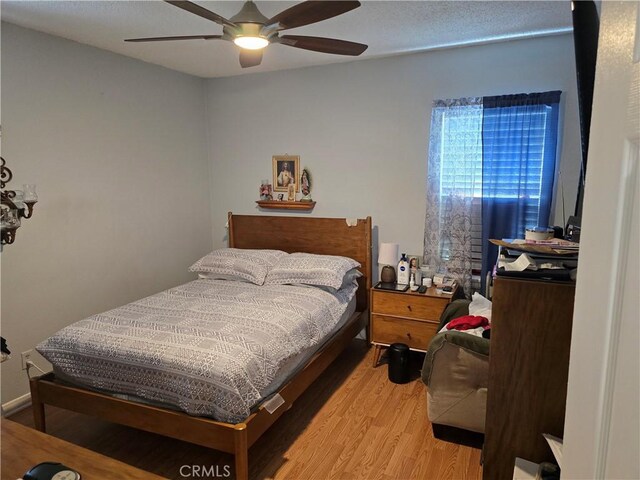 519 N Sloan Ave, Compton, CA 90221 - bedroom featuring light wood finished floors and a ceiling fan