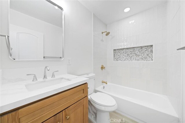 9613 Wilmington Ave, Los Angeles, CA 90002 - bathroom featuring toilet, vanity, and bathing tub / shower combination
