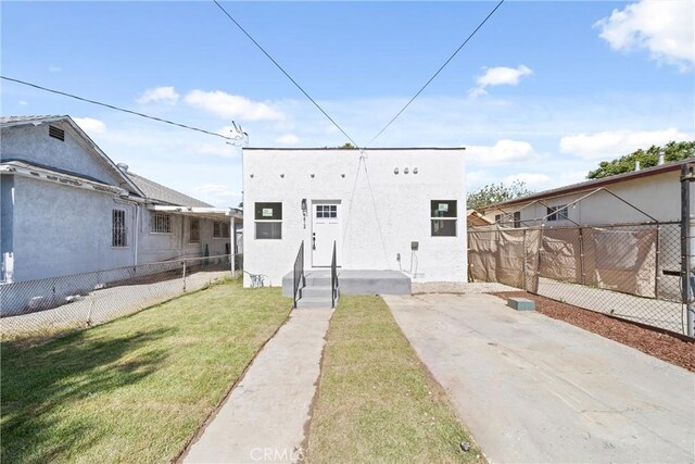 9613 Wilmington Ave, Los Angeles, CA 90002 - rear view of house with stucco siding