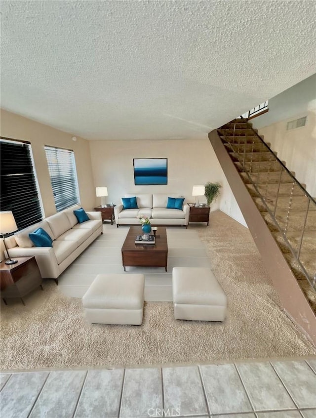 1060 N Lovekin Blvd Unit 2, Blythe, CA 92225 - living area featuring stairway and a textured ceiling