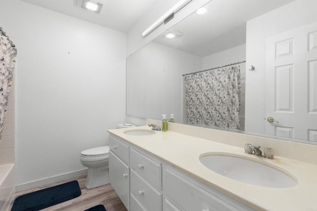 43075 Corte Fresca, Temecula, CA 92592 - full bath with double vanity, wood finished floors, and shower / tub combo