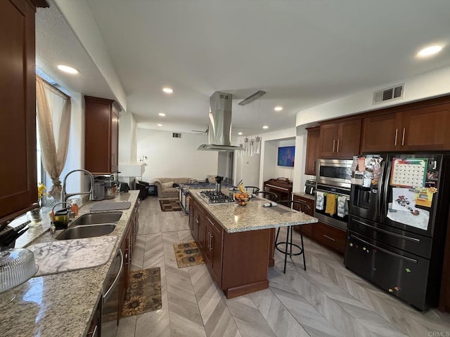 43075 Corte Fresca, Temecula, CA 92592 - kitchen featuring stainless steel appliances, exhaust hood, open floor plan, a kitchen breakfast bar, and a center island