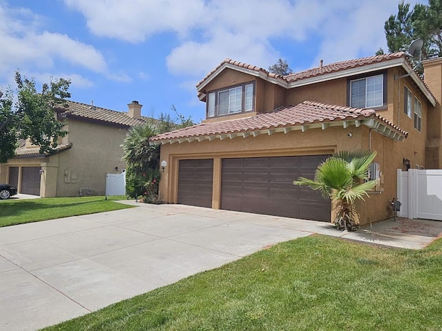 43075 Corte Fresca, Temecula, CA 92592 - mediterranean / spanish home featuring driveway, stucco siding, a tile roof, and an attached garage