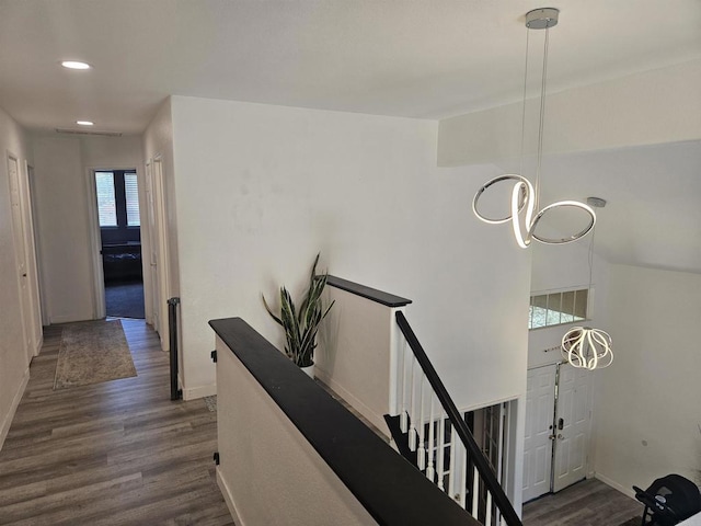 43075 Corte Fresca, Temecula, CA 92592 - hall with an upstairs landing, dark wood-style flooring, and recessed lighting