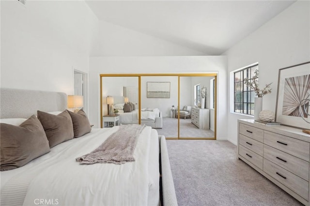 1924 Mathews Ave Unit B, Redondo Beach, CA 90278 - bedroom with light carpet, lofted ceiling, a closet, and baseboards