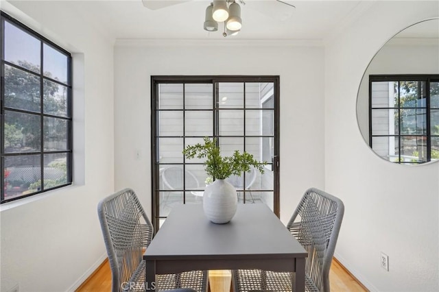 1924 Mathews Ave Unit B, Redondo Beach, CA 90278 - dining space featuring light wood finished floors, a ceiling fan, baseboards, and crown molding