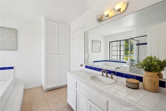 1924 Mathews Ave Unit B, Redondo Beach, CA 90278 - bathroom with a bath, vanity, tile patterned flooring, and baseboards