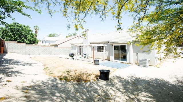 5538 Katrina Pl, Palmdale, CA 93552 - rear view of house featuring stucco siding, a fenced backyard, a patio, a pergola, and central AC