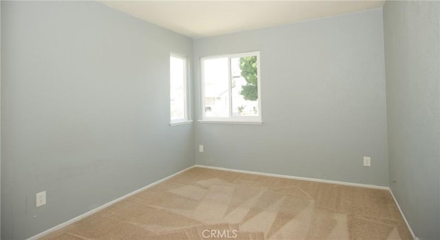5538 Katrina Pl, Palmdale, CA 93552 - spare room with light colored carpet and baseboards