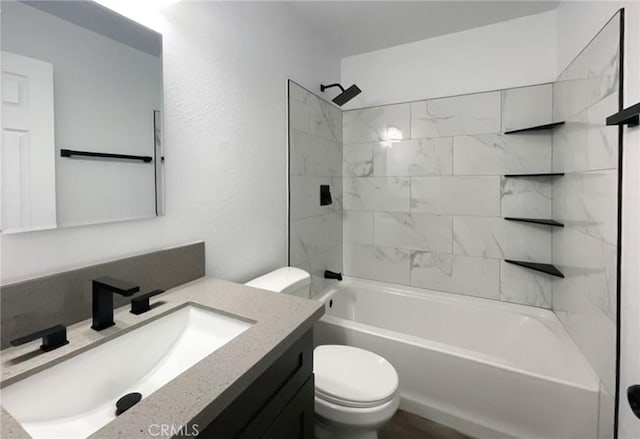 full bathroom with toilet, vanity, and shower / tub combination