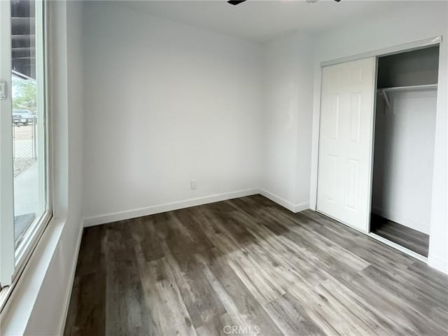 40294 Fieldspring St, Palmdale, CA 93591 - unfurnished bedroom featuring wood finished floors and a closet