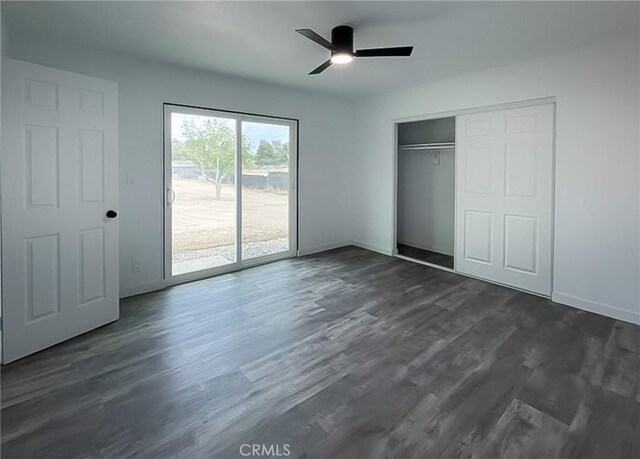 40294 Fieldspring St, Palmdale, CA 93591 - unfurnished bedroom with access to exterior, ceiling fan, and dark wood-style floors