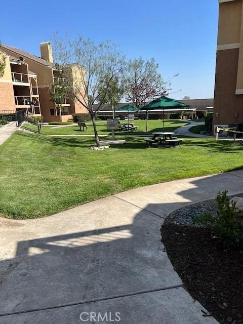 10655 Lemon Ave Unit 3005, Rancho Cucamonga, CA 91737 - view of community with a lawn