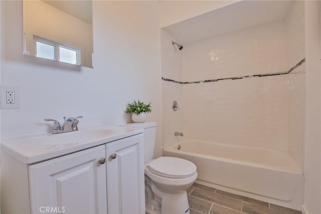 full bathroom with toilet, tub / shower combination, and vanity