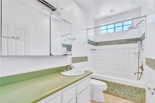 14807 Otsego St, Sherman Oaks, CA 91403 - full bath featuring toilet, vanity, tiled shower / bath, and tile patterned floors