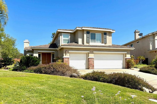 1752 Russet Leaf Ct, El Cajon, CA 92019 - view of front facade with stucco siding, an attached garage, driveway, a front yard, and brick siding
