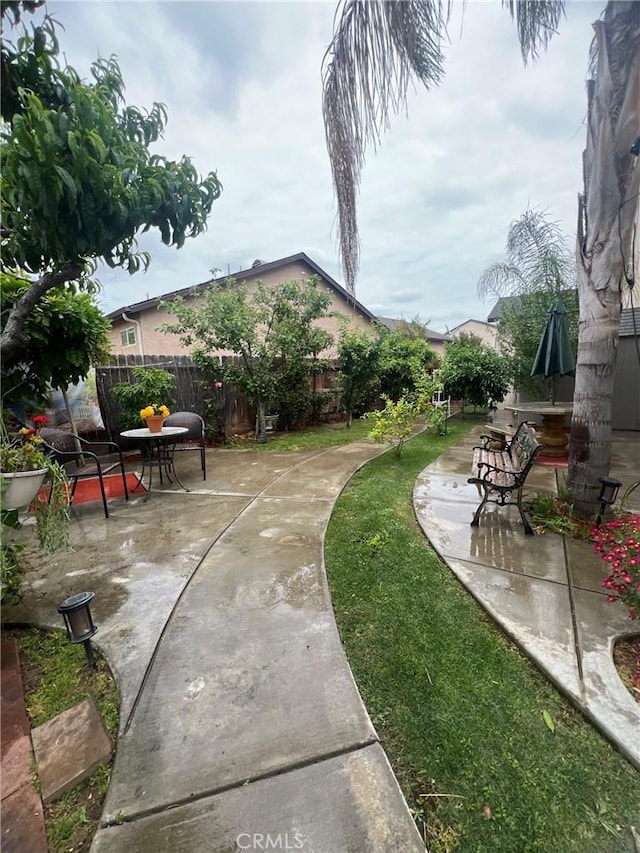 view of yard with a patio area and fence