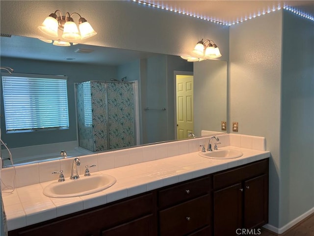 full bathroom with double vanity and a shower with shower curtain