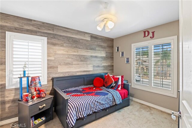 34274 Deergrass Way, Lake Elsinore, CA 92532 - bedroom featuring wooden walls, carpet floors, and baseboards
