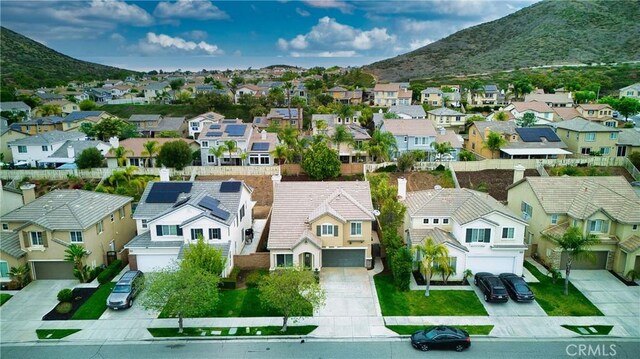 34274 Deergrass Way, Lake Elsinore, CA 92532 - aerial view of residential area with a mountain backdrop