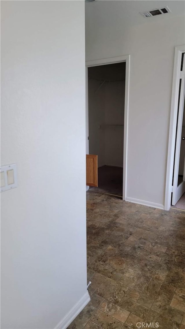 29746 Maxmillian Ave, Murrieta, CA 92563 - corridor featuring stone finish flooring and baseboards