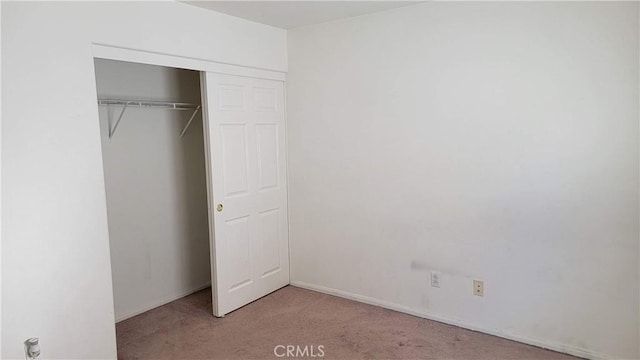 29746 Maxmillian Ave, Murrieta, CA 92563 - unfurnished bedroom with carpet, a closet, and baseboards