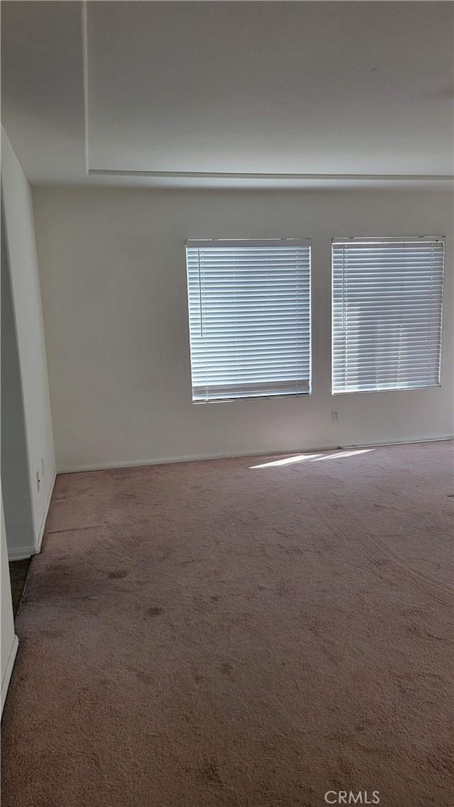 29746 Maxmillian Ave, Murrieta, CA 92563 - carpeted empty room with baseboards