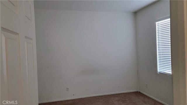 29746 Maxmillian Ave, Murrieta, CA 92563 - carpeted empty room with healthy amount of natural light and baseboards